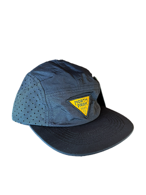Black nylon camp style hat with yellow and black triangle patch logo.