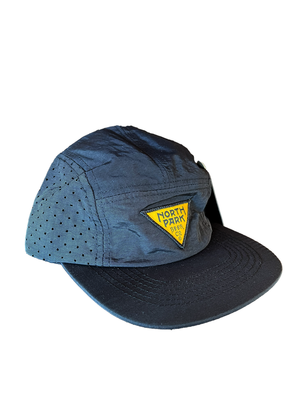 Black nylon camp style hat with yellow and black triangle patch logo.