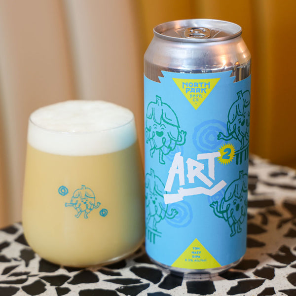 Can of Art Squared TDH Hazy DIPA next to a glass of beer