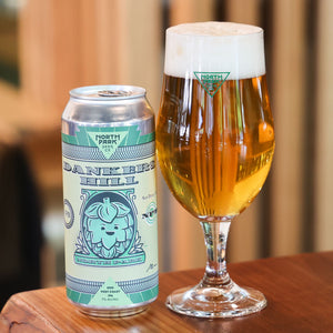 Can of Dankers Hill DDH West Coast IPA next to glass of beer