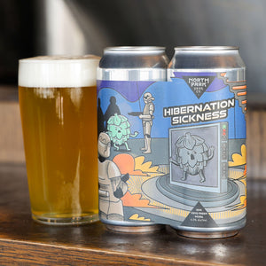 Can of Hibernation Sickness next to glass of beer