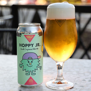 Can of Hoppy Jr. Dank Supreme Pale Ale next to glass of beer