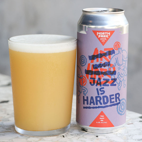 Can of Jazz is Harder TDH Hazy IPA next to glass of beer