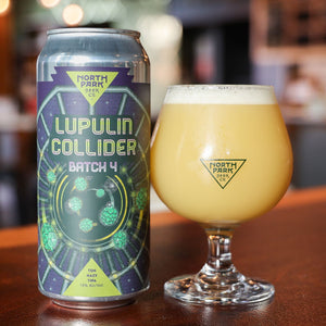 Photo of Lupulin Collider Batch 4 TDH Hazy TIPA can next to glass of beer