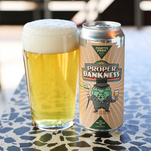 Can of Proper Dankness TDH West Coast IPA next to glass of beer