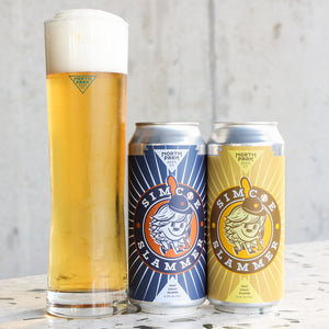 Two cans of Simcoe Slammer West Coast PIlsner next to glass of beer