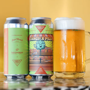 Two cans of Tangier Pils West Coast Pilsner next to glass of beer