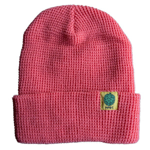 Waffle Knit Peach Beanie with our Happy Face Hop Buddy on a cheerful yellow hem tag.